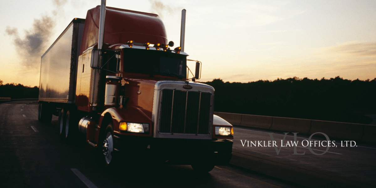 Semi truck driving on highway | truck jackknife accidents | Vinkler Law Offices LTD